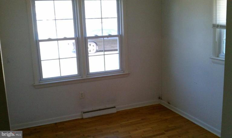 102 East Fourteenth Avenue Ranson, WV 25438 - Photo 9 of 9 an empty room with a window
