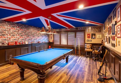 a kitchen with stainless steel appliances granite countertop a refrigerator and a stove