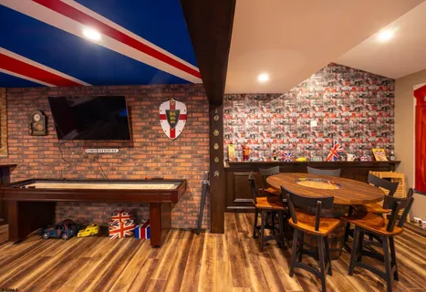 a bed room with a bed and a ceiling fan