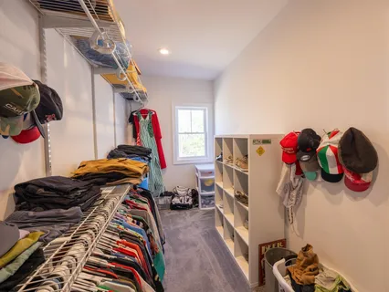 a bathroom with a toilet a sink and shower