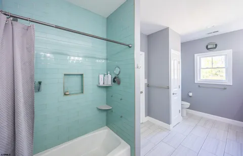 a view of a garage with a bike and wooden roof