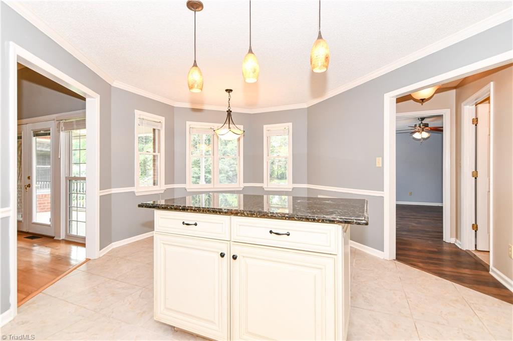 4215 Finch Farm Road Trinity, NC 27370 - Photo 11 of 30 Kitchen island with storage.