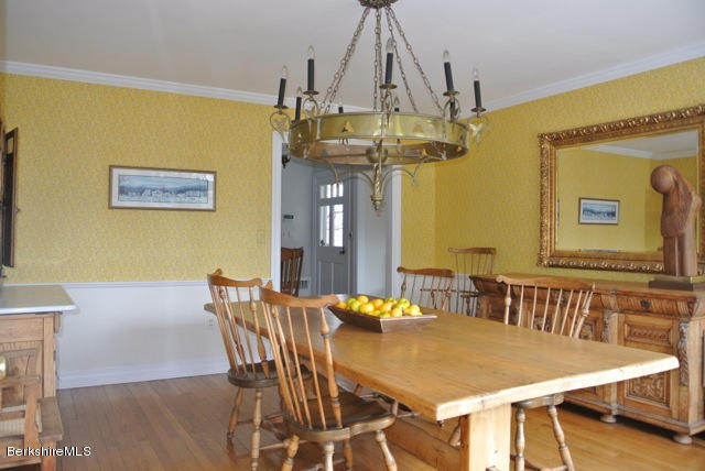 25 Prospect Hill Road Stockbridge, MA 01262 - Photo 17 of 30 a view of a dining room with furniture and wooden floor