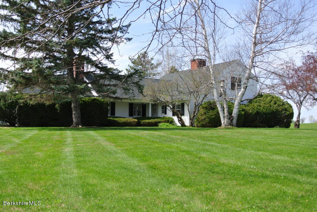 25 Prospect Hill Road Stockbridge, MA 01262 - Photo 26 of 30 a front view of a house with a garden