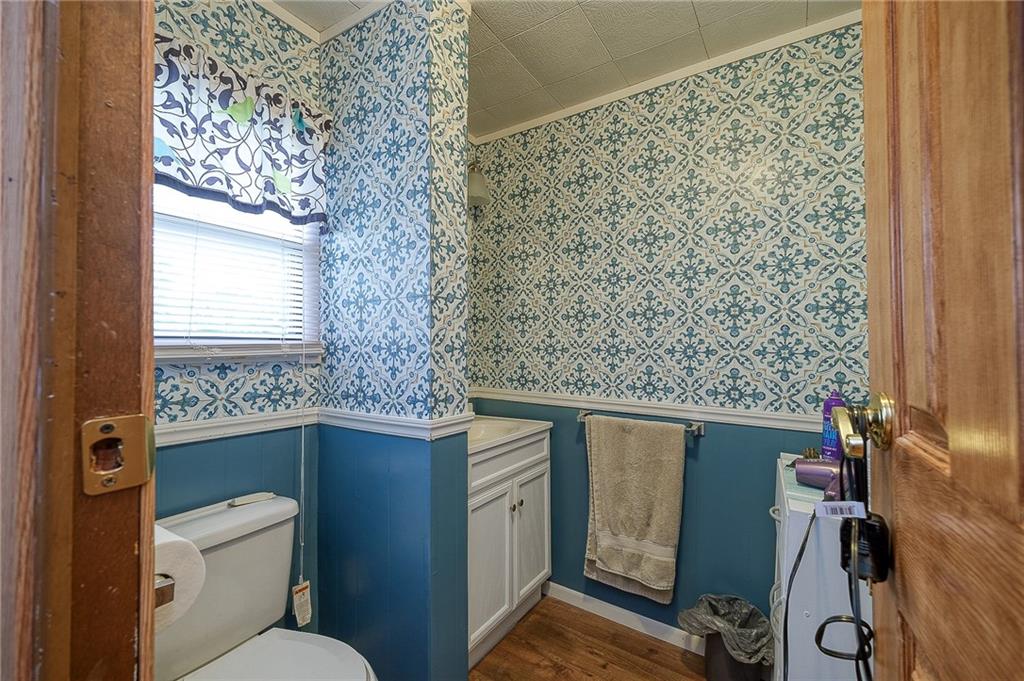 120 Purvis Road Butler, PA 16001 - Photo 15 of 27 a bathroom with a toilet sink and a window