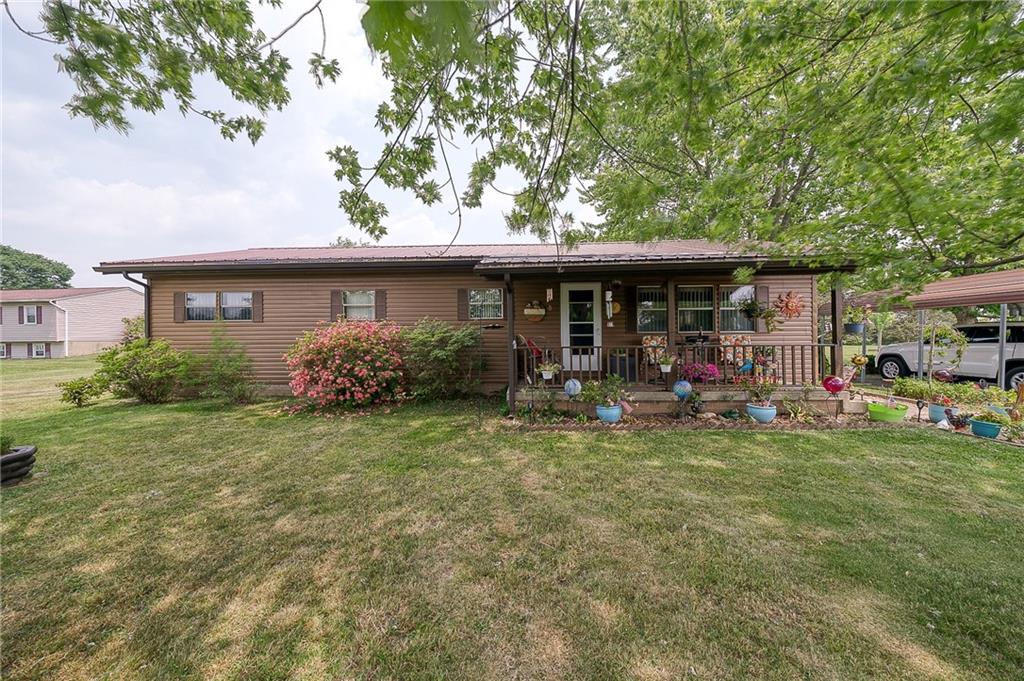120 Purvis Road Butler, PA 16001 - Photo 2 of 27 a front view of a house with garden