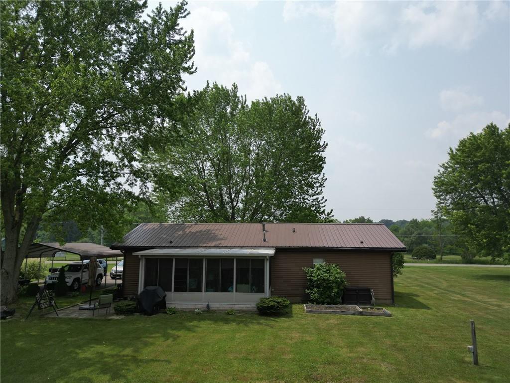 120 Purvis Road Butler, PA 16001 - Photo 24 of 27 a front view of a house with a garden