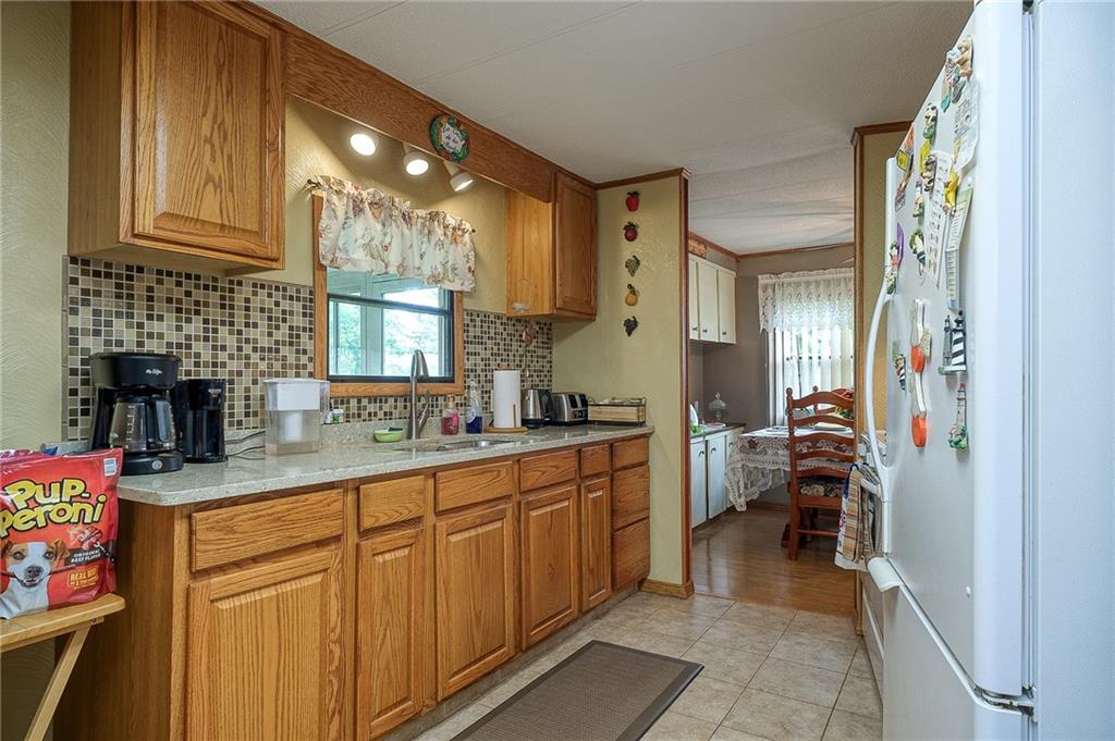 120 Purvis Road Butler, PA 16001 - Photo 7 of 27 a kitchen with sink and cabinets