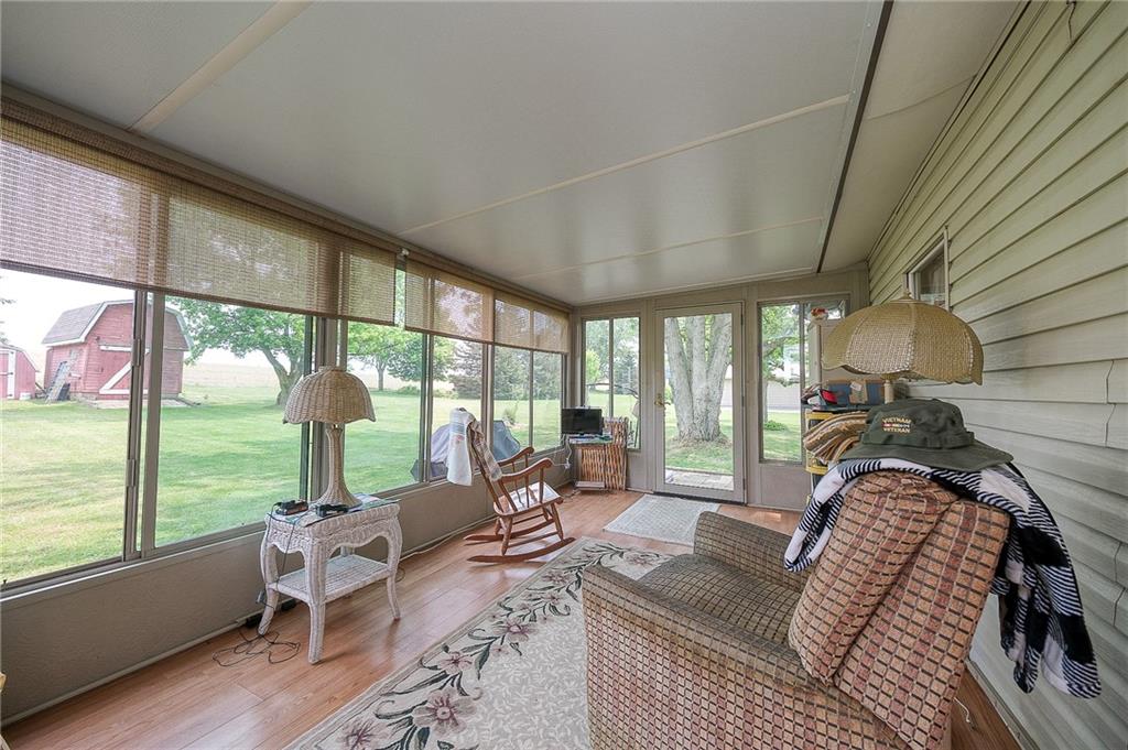 120 Purvis Road Butler, PA 16001 - Photo 10 of 27 a living room with furniture and floor to ceiling windows