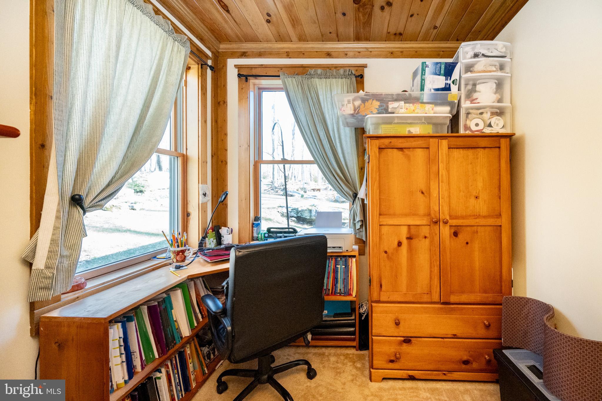 328 Stool Rock Road Oakland, MD 21550 - Photo 6 of 133 a view of a room with wooden floor and furniture