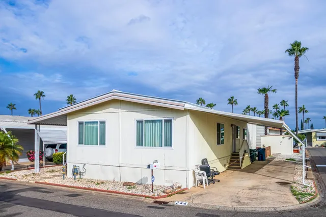 a front view of a house with garage