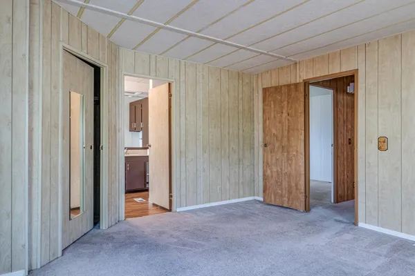 a spacious bathroom with a sink toilet and shower