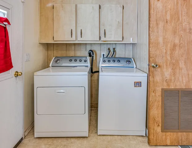 a view of a swimming pool with outdoor seating