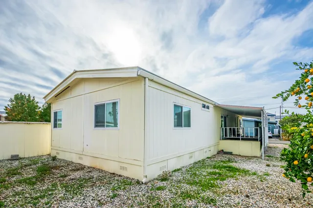 a house with trees in front of it