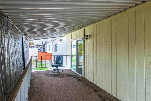 a view of swimming pool with patio
