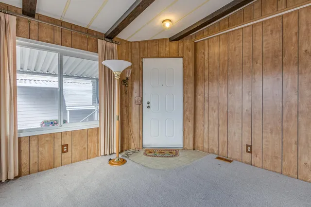 a view of a hallway with closet