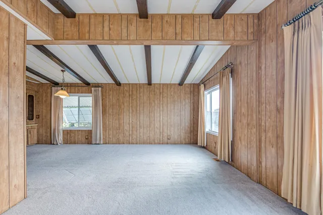 a view of a room with a window