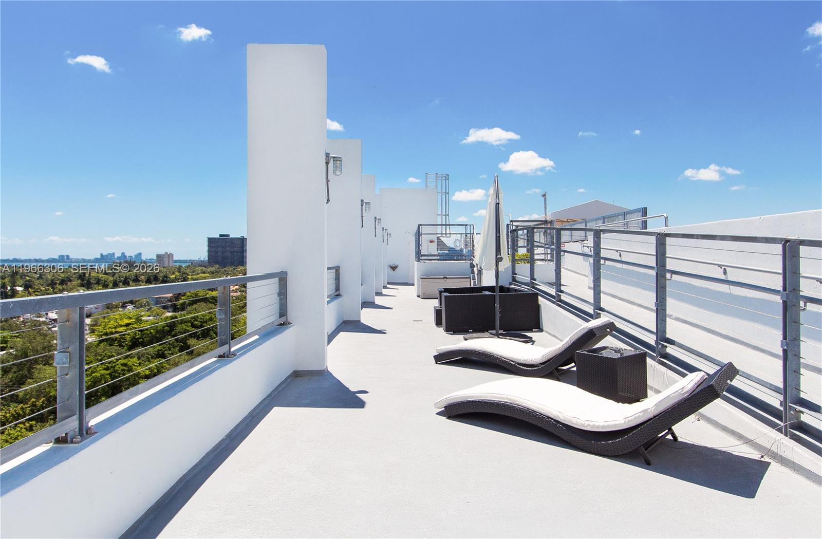 8101 Biscayne Boulevard, Unit R613 Miami, FL 33138 - Photo 20 of 33 a view of a living room and dining room