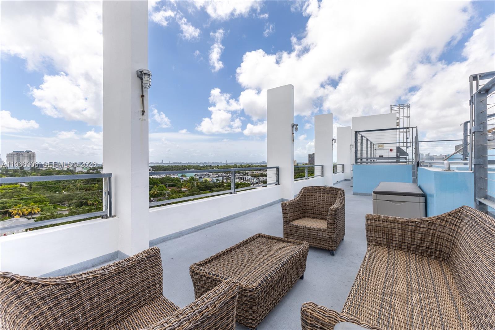 8101 Biscayne Boulevard, Unit R613 Miami, FL 33138 - Photo 28 of 33 a balcony with furniture and city view
