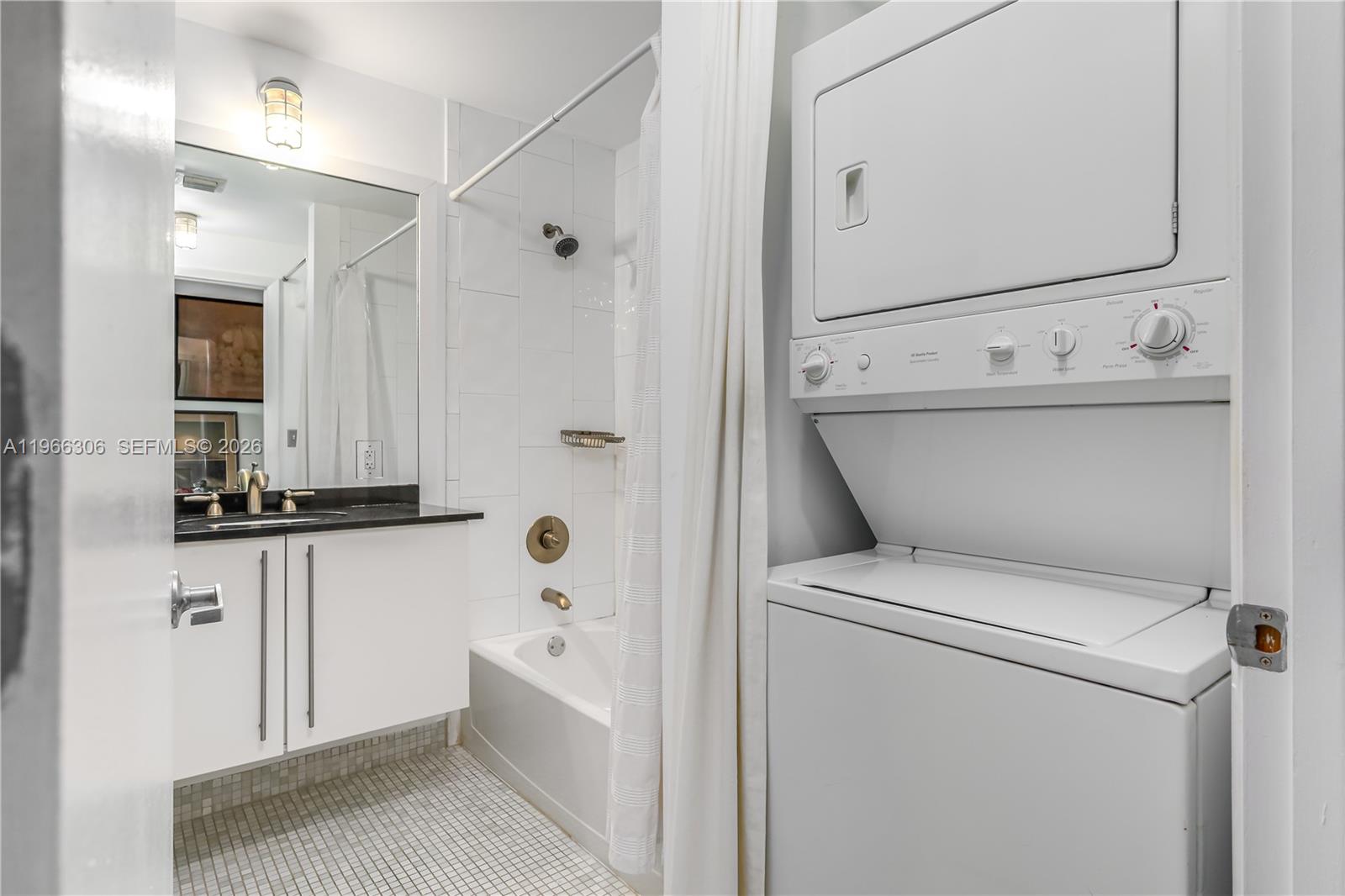 8101 Biscayne Boulevard, Unit R613 Miami, FL 33138 - Photo 33 of 33 a bathroom with a sink a toilet and shower