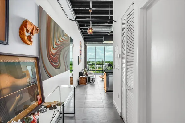 a kitchen with stainless steel appliances granite countertop a stove and a refrigerator