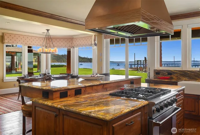 a kitchen with a stove and a sink