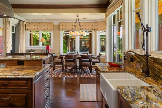 a view of a dining room with furniture window and outside view