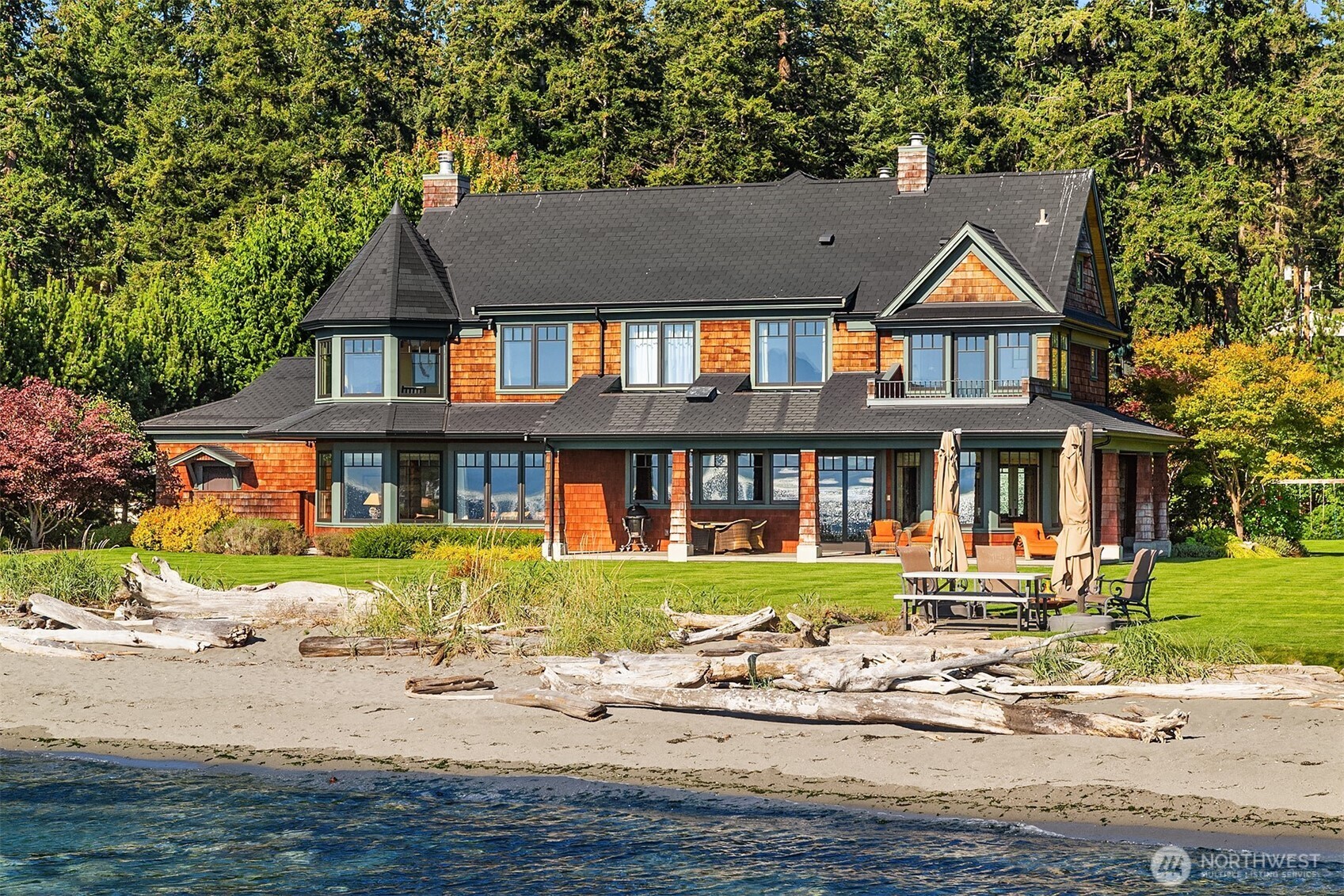 5844 Mutiny Bay Road Freeland, WA 98249 - Photo 8 of 35 a front view of a residential houses with yard and road