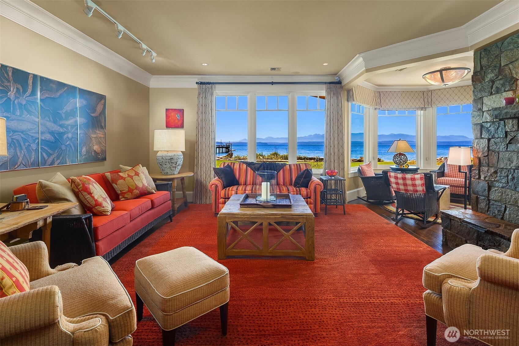 5844 Mutiny Bay Road Freeland, WA 98249 - Photo 10 of 35 a living room with furniture kitchen view and a large window