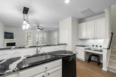 a view of entryway with wooden floor