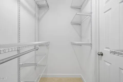 a white bath tub sitting next to a window