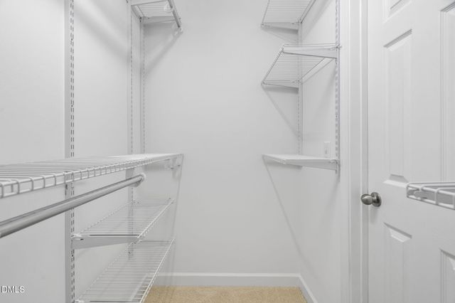 a white bath tub sitting next to a window