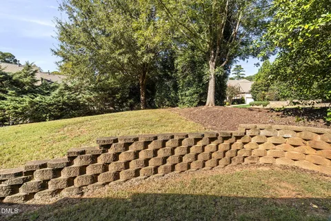 a view of a backyard of the house