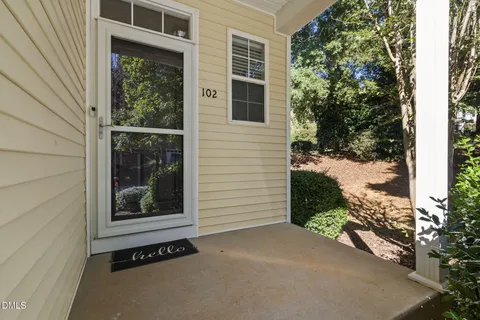 a view of a door and a window