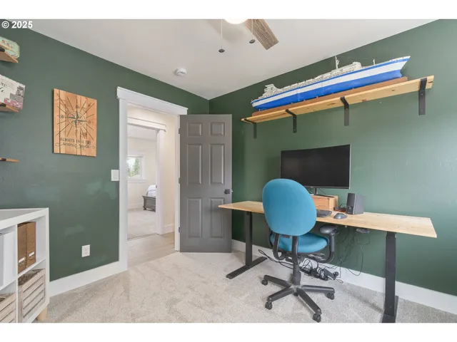 a workspace with furniture and a chair