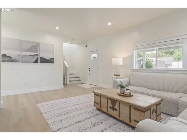 a spacious bathroom with a sink a mirror and a toilet