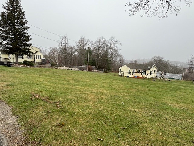27 Havana Road Worcester, MA 01603 - Photo 3 of 6 a view of a field with clear trees