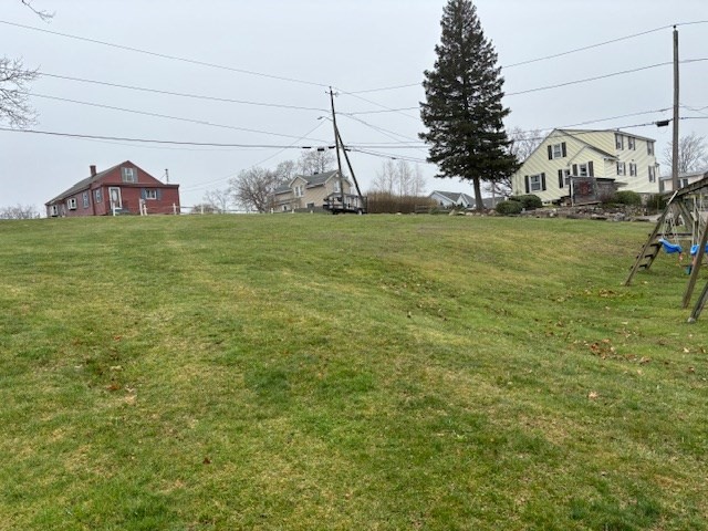 27 Havana Road Worcester, MA 01603 - Photo 4 of 6 a view of a field with houses
