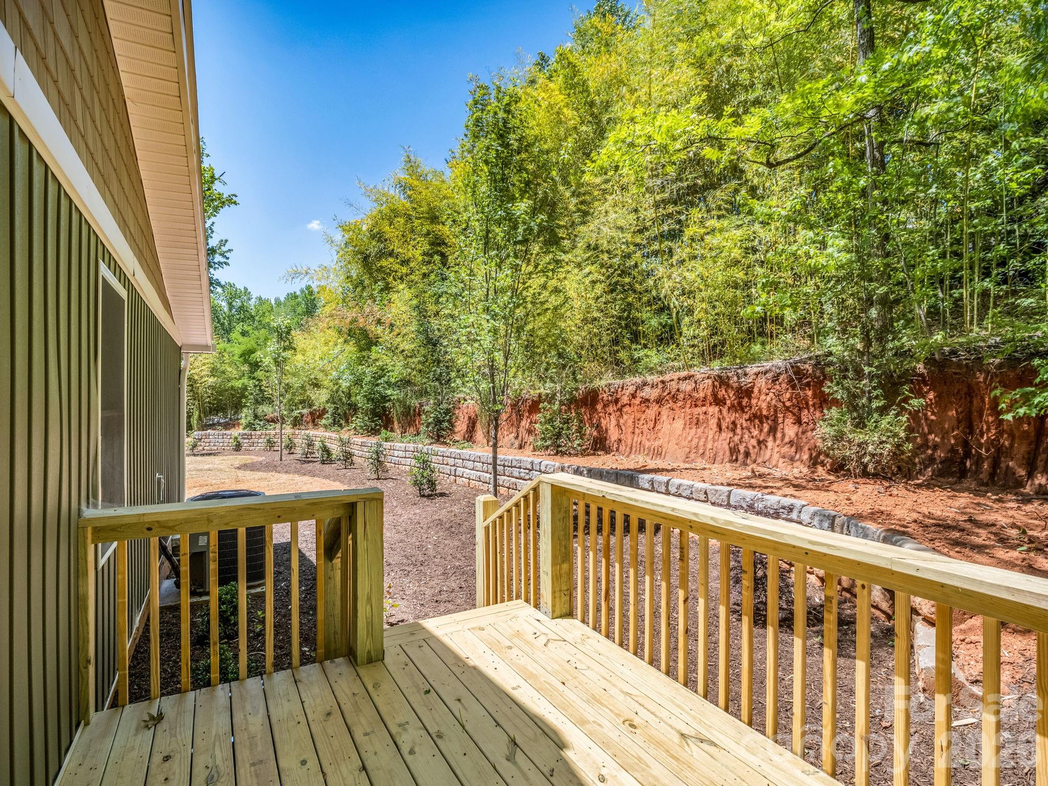 5923 Highway 14 Landrum, SC 29356 - Photo 7 of 15 a view of balcony with wooden floor and fence