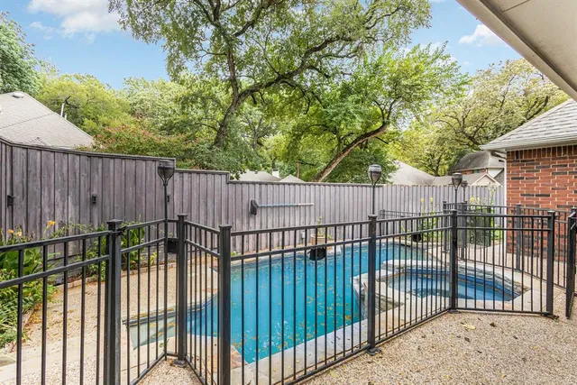 a view of a gate and fence