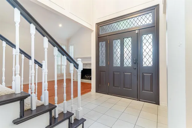 a view of an entryway with staircase