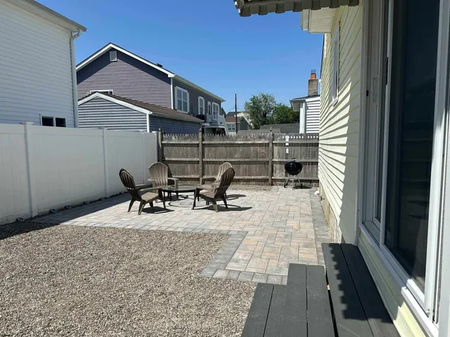 a view of a terrace with chairs