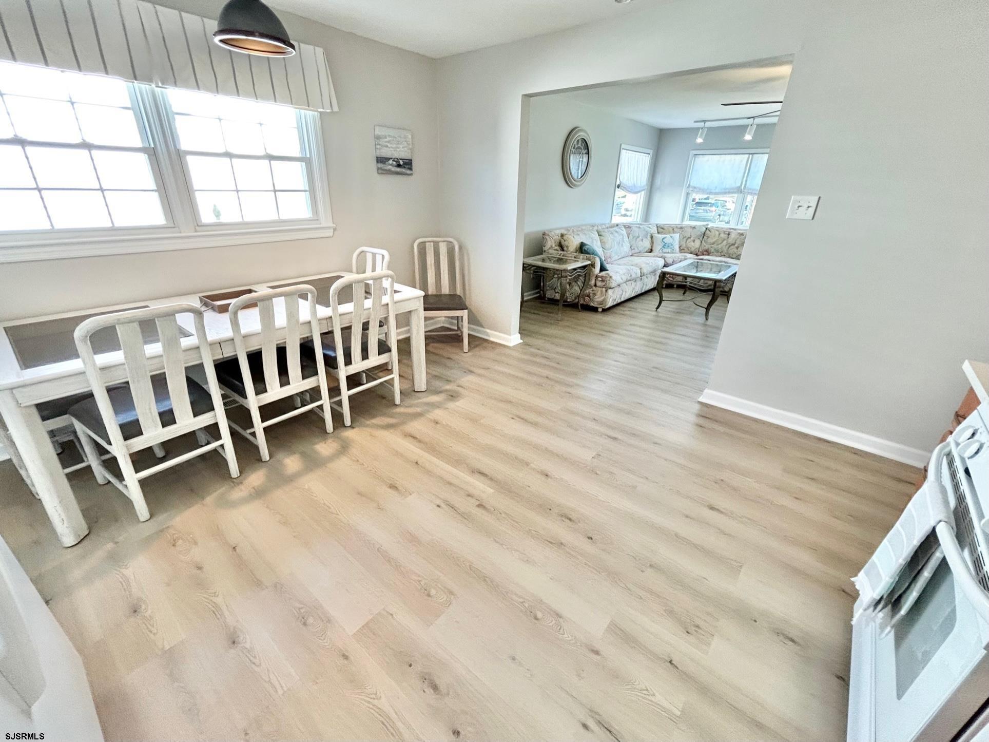 302 Sheridan Place Brigantine, NJ 08203 - Photo 2 of 15 a bedroom with furniture and a window