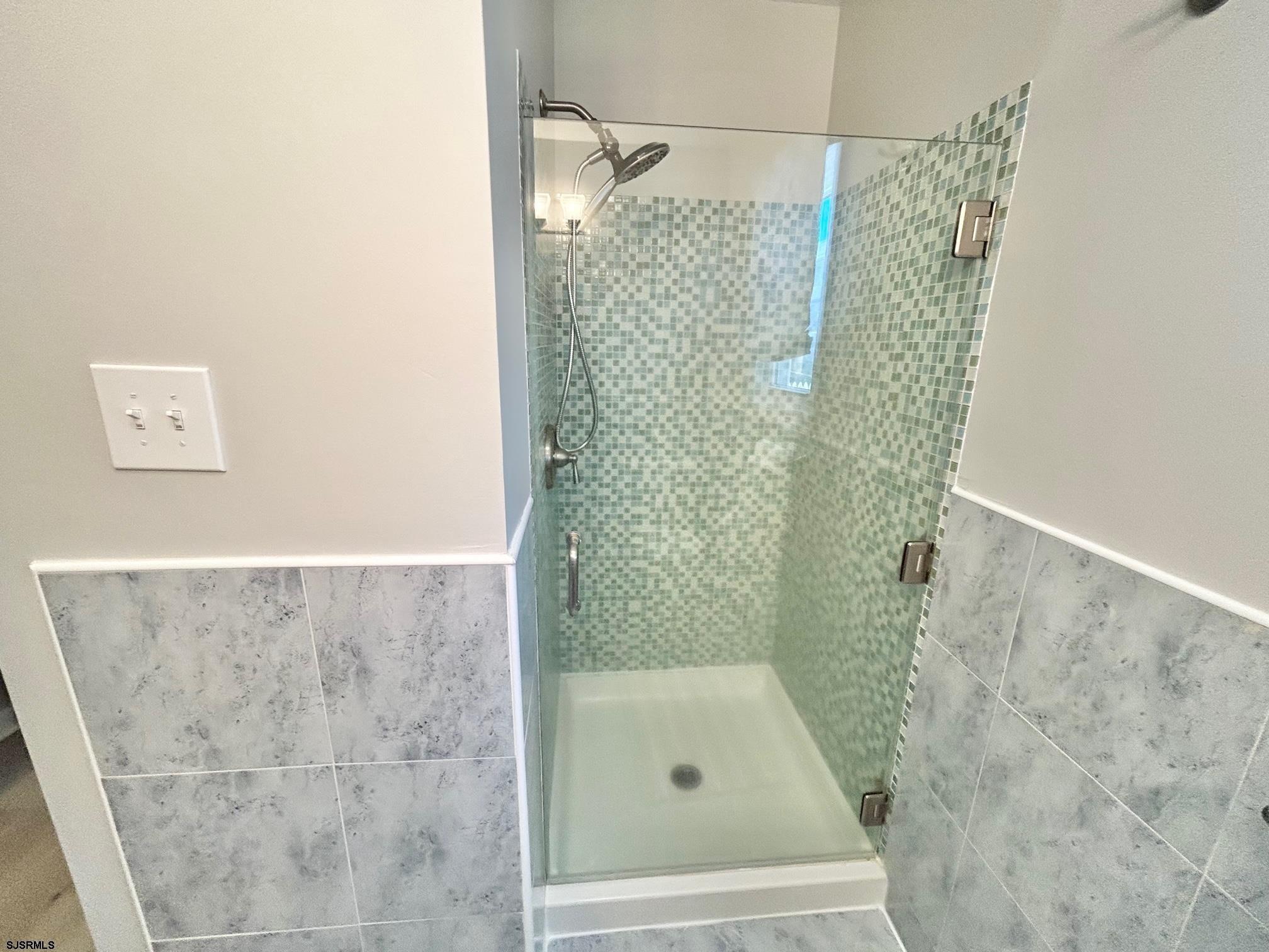 302 Sheridan Place Brigantine, NJ 08203 - Photo 7 of 15 a bathroom with a shower
