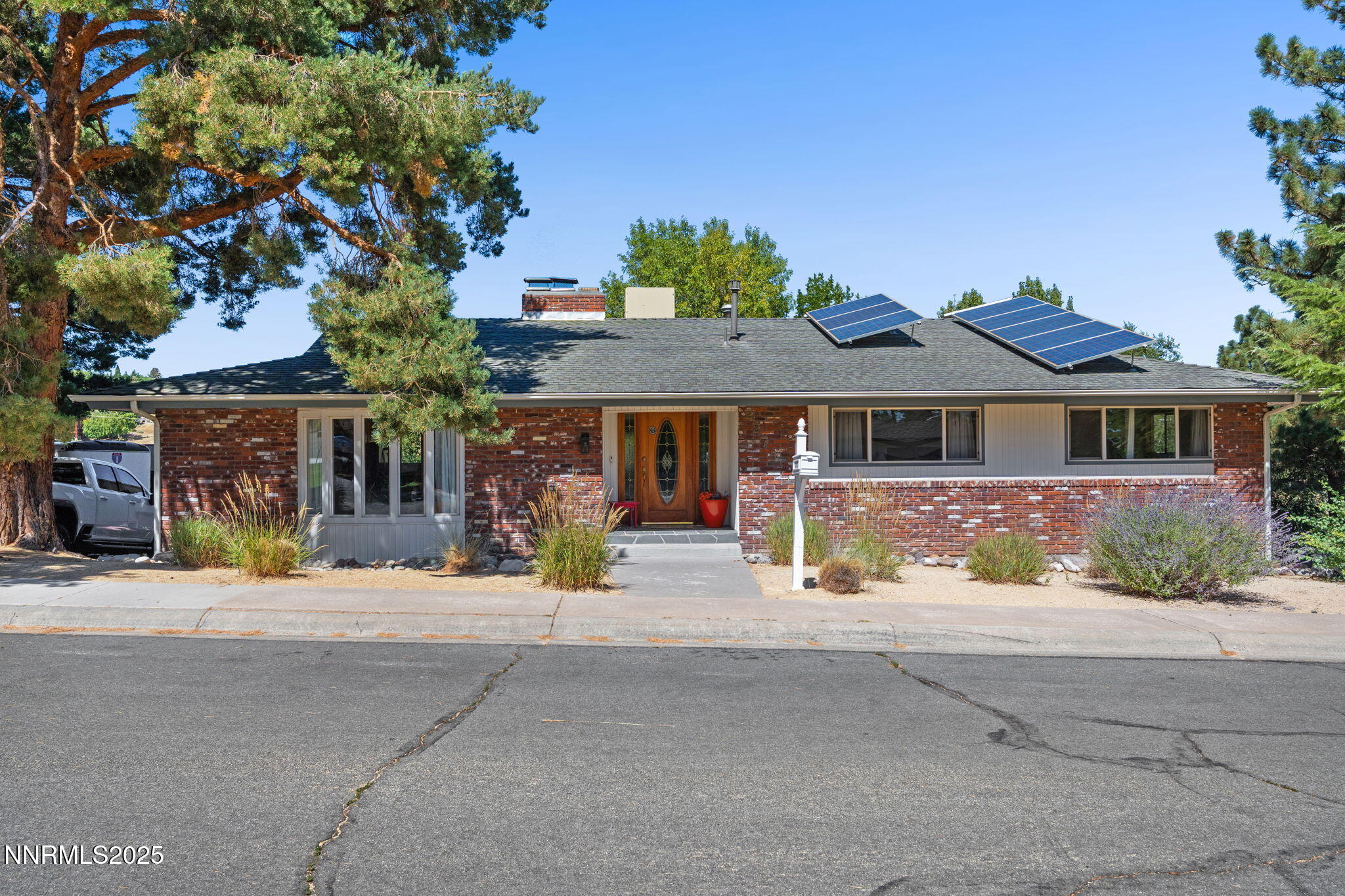 2275 Solari Drive Reno, NV 89509 - Photo 1 of 52 front view of a house with a small yard