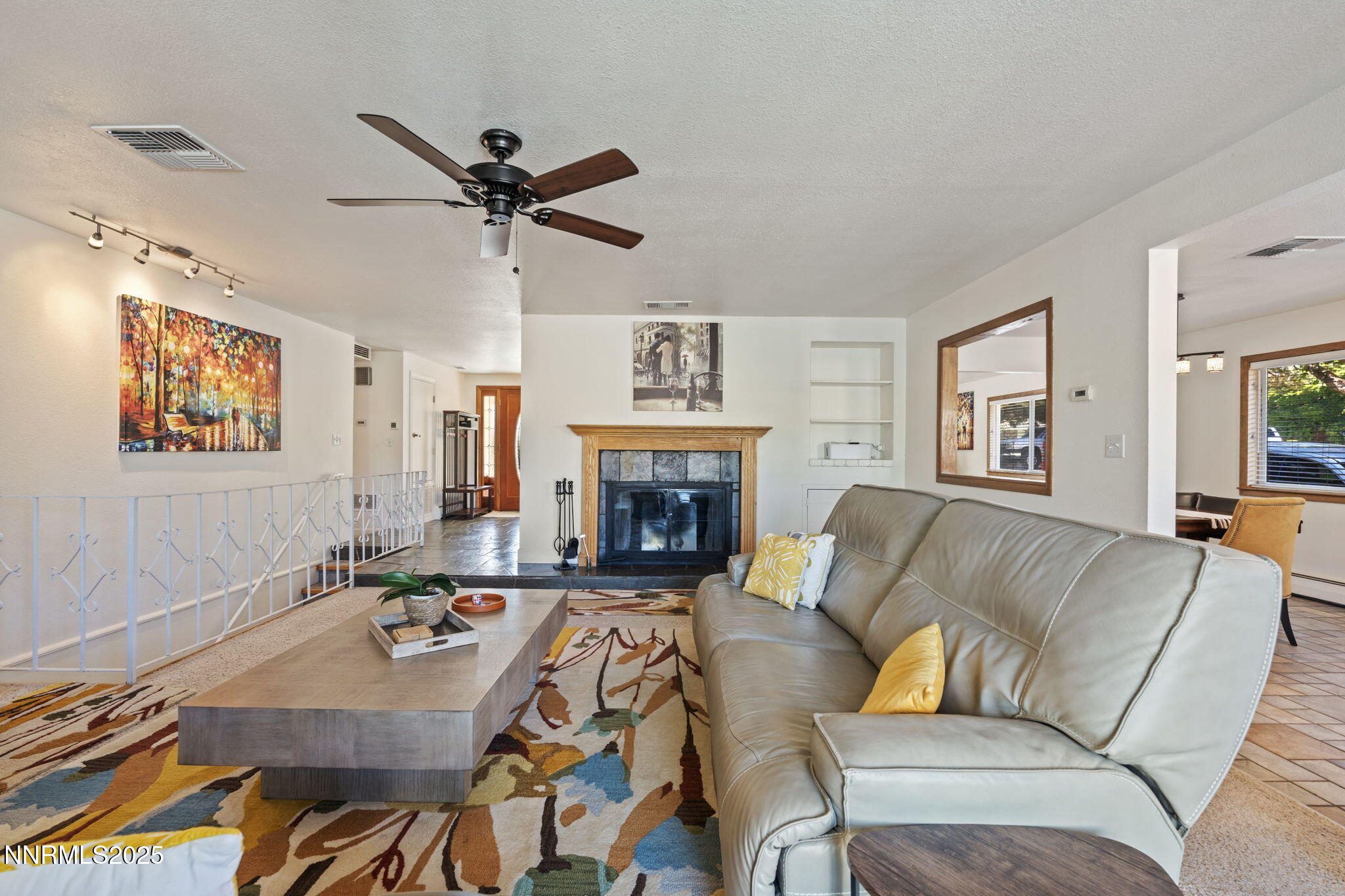 2275 Solari Drive Reno, NV 89509 - Photo 19 of 52 a living room with furniture and a fireplace