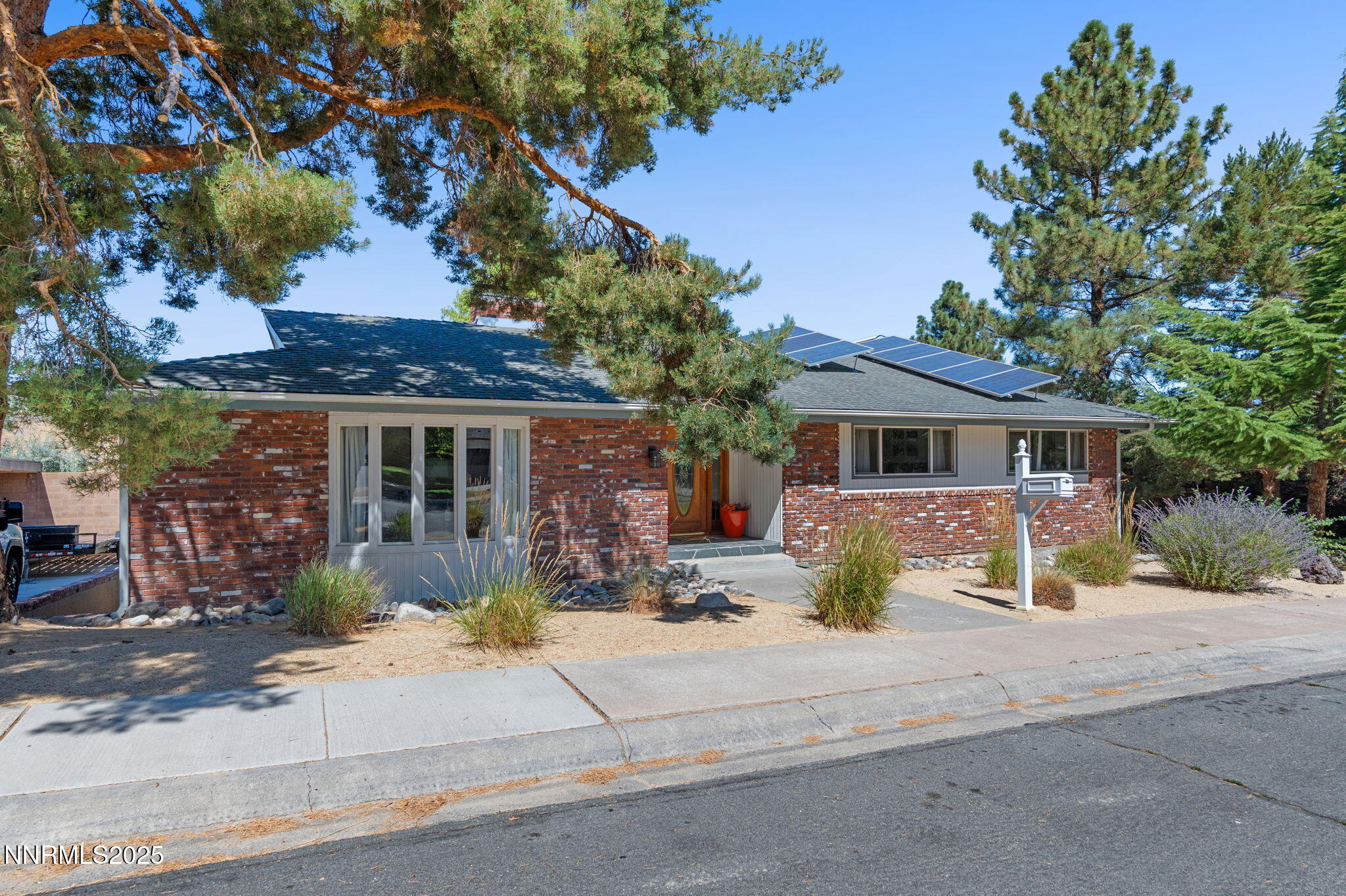 2275 Solari Drive Reno, NV 89509 - Photo 2 of 52 front view of a house with a yard