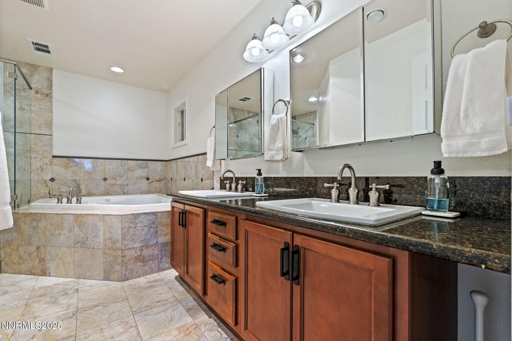2275 Solari Drive Reno, NV 89509 - Photo 25 of 52 a kitchen with a sink stove and cabinets