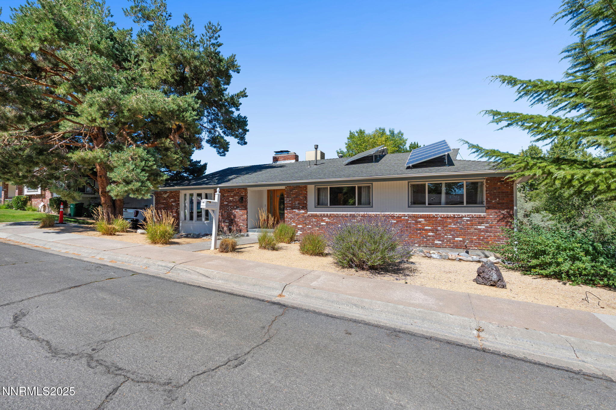 2275 Solari Drive Reno, NV 89509 - Photo 3 of 52 front view of house with a yard