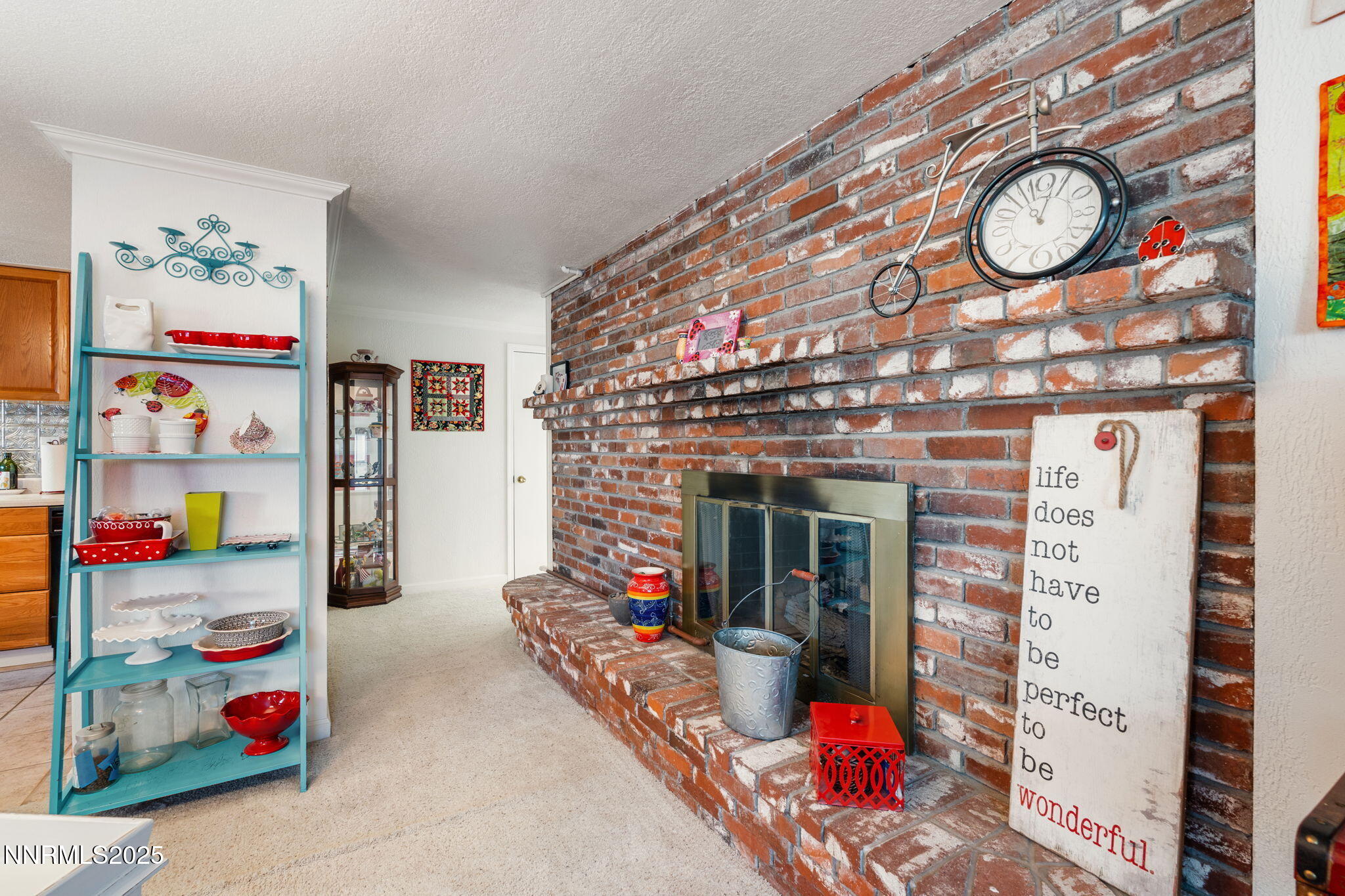 2275 Solari Drive Reno, NV 89509 - Photo 34 of 52 a very nice looking bedroom with a red chair